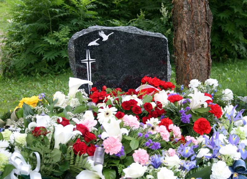 flowers at grave T Hamilton Memorials flowers at grave